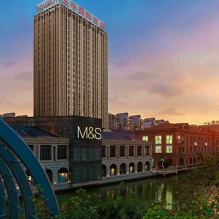 Gallery F Hotel Ухань Экстерьер фото